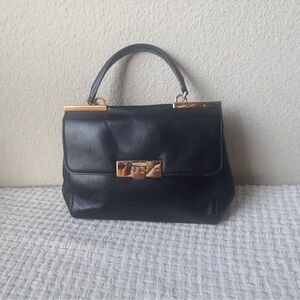 Michael Kors Elegant Black
Leather Handbag Gold Hardware